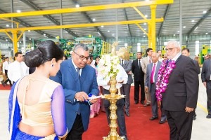  Lighting of the traditional oil lamp by GRI's managing director Prabhash Subasinghe.