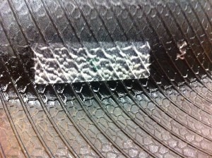 As displayed by the partners during the recent Tire Technology Expo in Cologne, Germany, the product features a fabric label containing an RFID a a   antenna and chip. It is designed to survive the harsh environments encountered during storage.