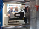 Netstal reinforced its reputation for high-precision machines with what it is claiming to be a world first: injection compression moulding (ICM) using stack moulds. At Fakuma, Netstal demonstrated the process on an Elion 2800-2000 machine using a 4+4 cavity mould, making a margarine tub from PP that weighs only 10.7 grams. The project required close collaboration between Netstal, the French mould maker Plastisud SA and the automation specialist Machines Pagès SA, based in France.