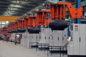 While limited production started at the plant three years ago, the factory is still far from complete, with a 32,000-sq.-ft. research and development centre under construction, a bank of curing presses still to be installed, and an area set aside for adding a building and curing area dedicated to 57-inch tires.