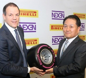  Claudio Passerini, COO consumer Latam of Pirelli Pneus Ltda.,and Jack Oh, vice president, overseas sales for Nexen Tire, mark the signing of an agreement for Pirelli to distribute Nexen products in Brazil.