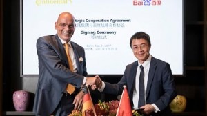  Frank Jourdan, of Conti’s executive board and president of its chassis &amp; safety division, and Qi Lu, group president and COO of Baidu, after signing the agreement on 31 May in Berlin.