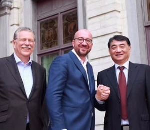  ZC Rubber's Shen Jinrong (right) shakes hands with Belgium prime minister Charles Michel, while Bekaert president Bert De Graeve looks on.