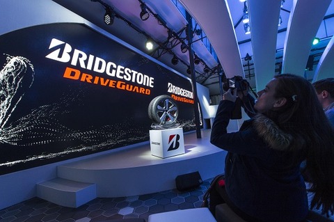 Bridgestone half-year income down, sales up