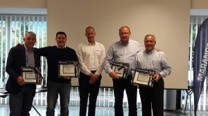  From the left: Luciano Meta, Roberto Santorum, Christoph Frost (sales and marketing director, retreading systems), Christian Asmuth, Mike Carter