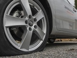 Bridgestone cuts earnings forecast on costs, US slowdown