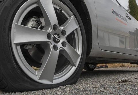 Bridgestone cuts earnings forecast on costs, US slowdown