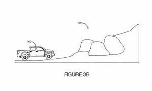  When a vehicle approaches off-road terrain, such as boulders or a large ditch, the system would use image processing technology to determine whether the vehicle could cross. Photo credit: Ford patent documents