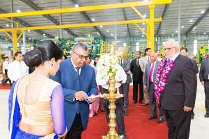  Lighting of the traditional oil lamp by GRI's managing director Prabhash Subasinghe.