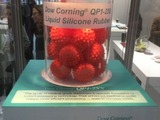 LSR World Red balls promoted the launch of QP1-250 easy-flow LSR at Compamed