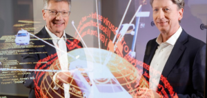  Continental CEO Elmar Degenhart (L) and CFO Wolfgang Schäfer show the digital protection shield of a car in March 2018