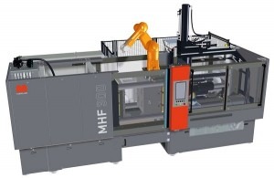  The MHF 700D/300 hydraulic horizontal machine combined with the silicone stuffer unit for processing HTV silicone and automatic moulded parts removal with subsequent depositing on the conveyor belt.