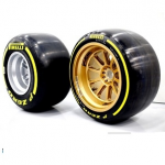  Current 13-inch spec F1 racing tire (left) vs. proposed 18-inch version