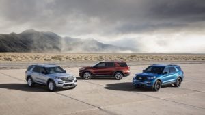  The 2020 Explorer (left), Explorer Hybrid (center) and Explorer ST. Photo by Ford