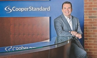 Cooper Standard reports 46% earnings fall, lowers forecast