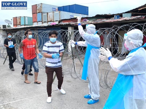 Top Glove halting production at 28 factories amid Covid outbreak