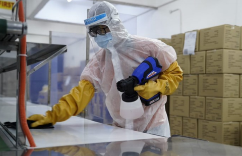 Top Glove reopens Covid-hit factories with enhanced precautions